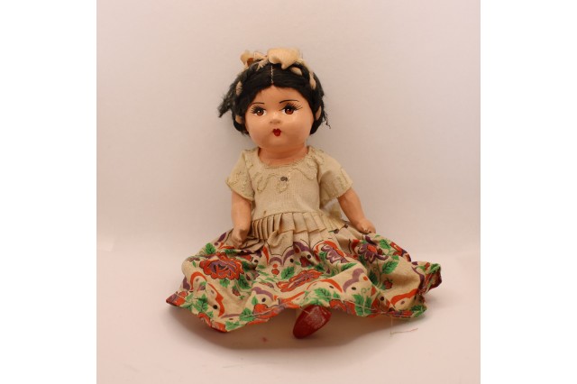 One of Ofelia's oldest dolls, brought from Mexico by her mother 